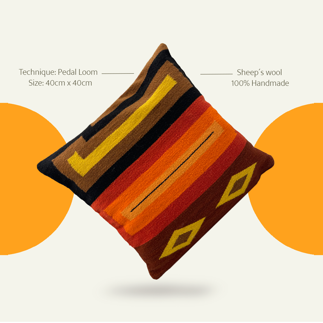 Earth-tone cushion cover made from ethically sourced peruvian wool and naturally dyed with intricate handwoven details.