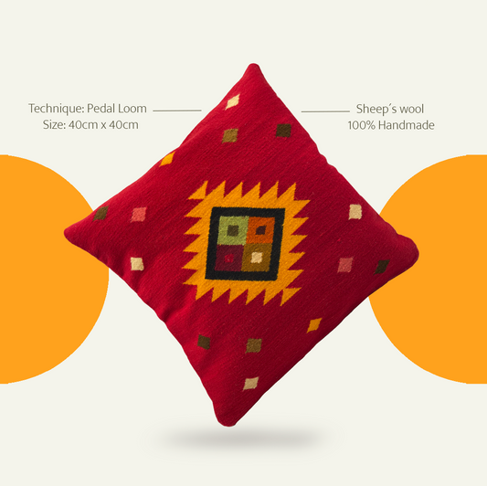 Bold handcrafted cushion cover in vibrant red, showcasing artisanal Peruvian weaving with eco-friendly materials